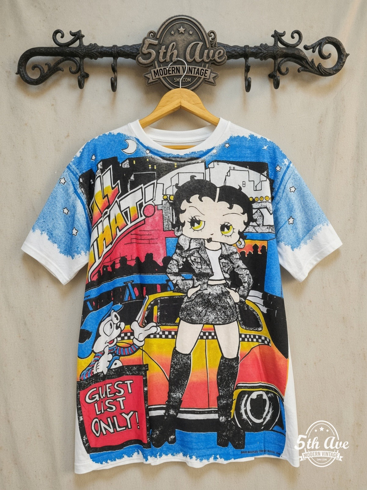 Betty Boop – Guest List Only – All Over Print – New Vintage Graphic Tee — front on locked cream ornate 5th Ave rack