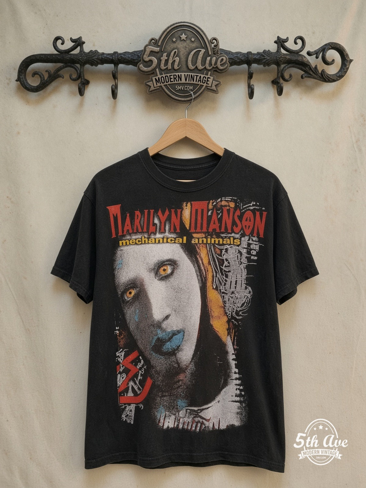 Marilyn Manson – Mechanical Animals Blue Lips – Vintage Band T-Shirt — front on locked cream ornate 5th Ave rack