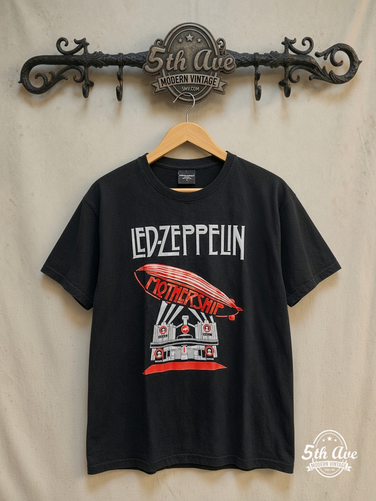 Led Zeppelin Retro Classic Rock Vintage Band T-Shirt – Vintage Band T-Shirt — front on locked cream ornate 5th Ave rack