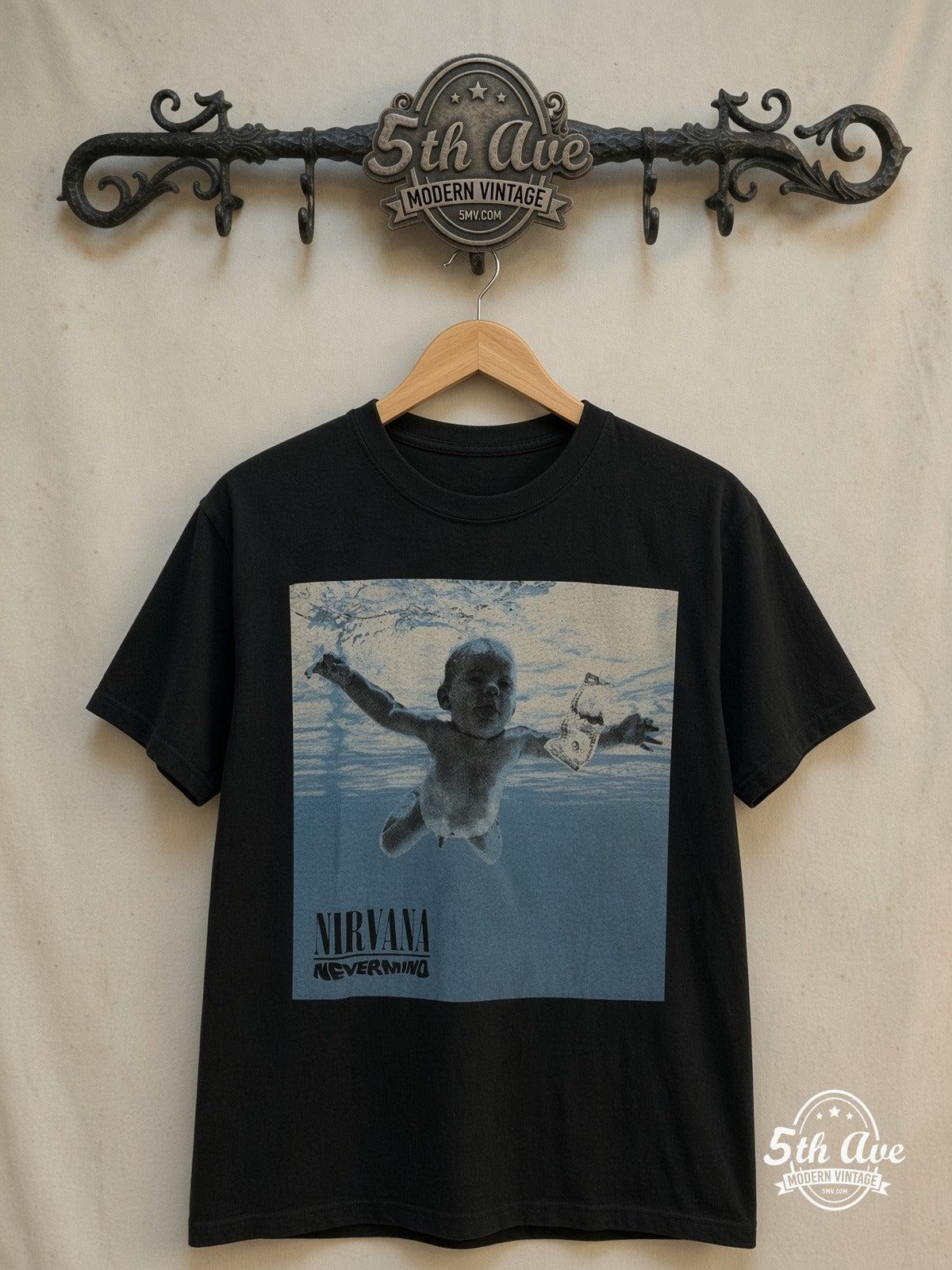 Nirvana – Nevermind Album Art – Vintage Band T-Shirt — front on locked cream ornate 5th Ave rack