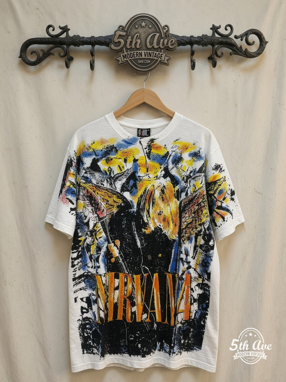 Nirvana – In Utero – All Over Print – Vintage Band T-Shirt — front on locked cream ornate 5th Ave rack
