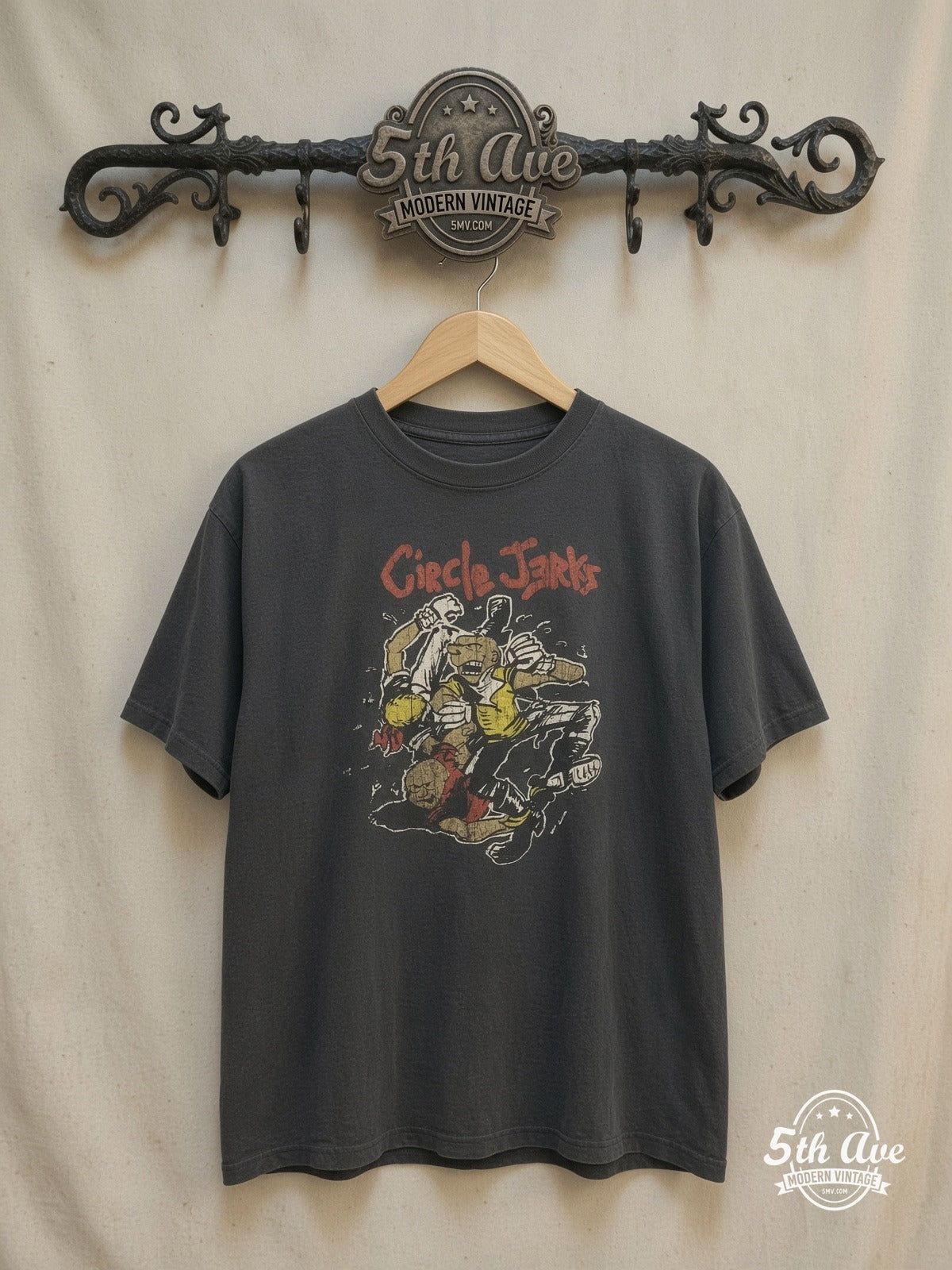 Sucks Green Van Showdown: Circle Jerks Vintage Punk Tee – Vintage Band T-Shirt — front on locked cream ornate 5th Ave rack