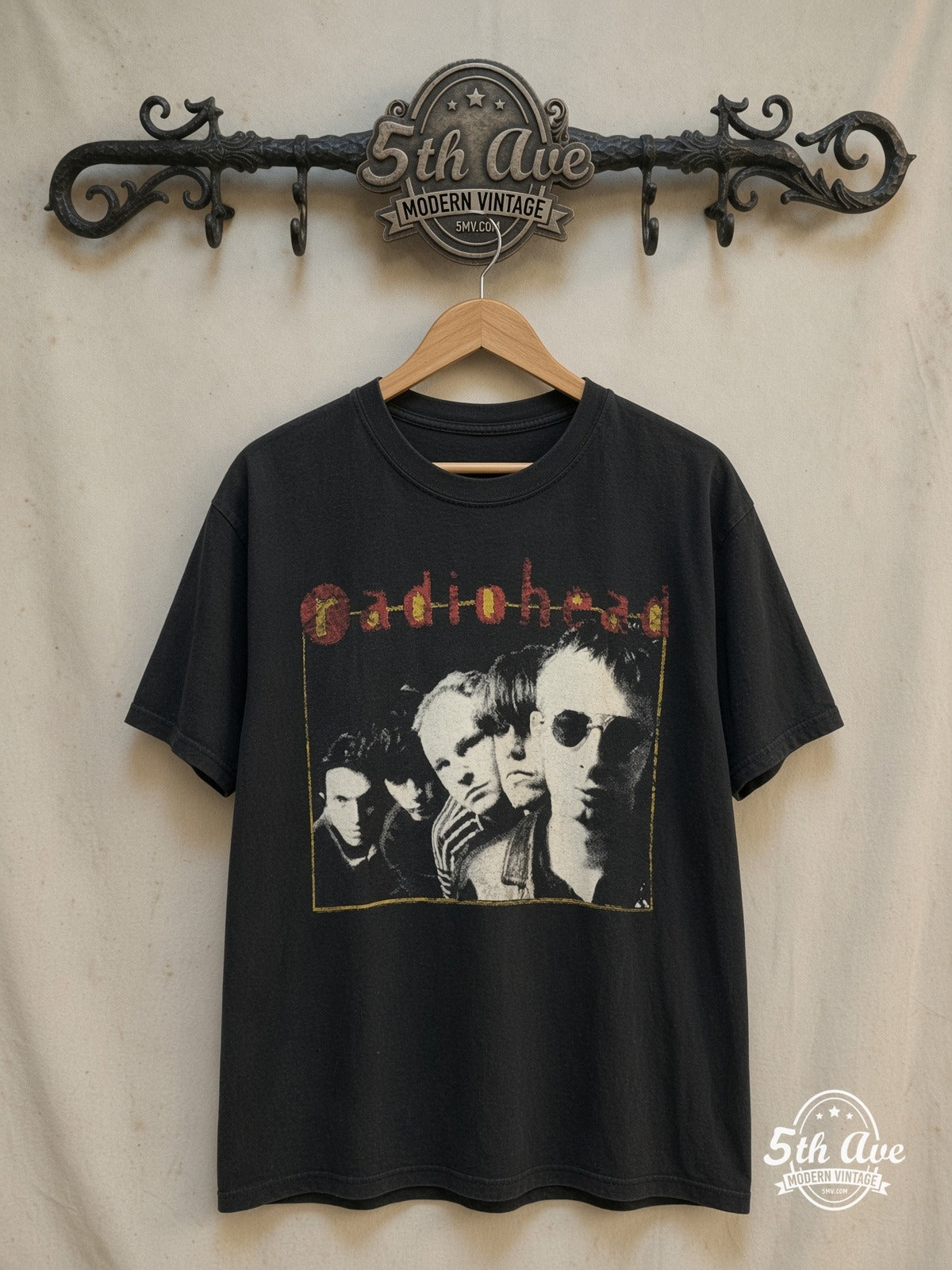 Radiohead – Band Photo Yellow Square Border – Vintage Band T-Shirt — front on locked cream ornate 5th Ave rack