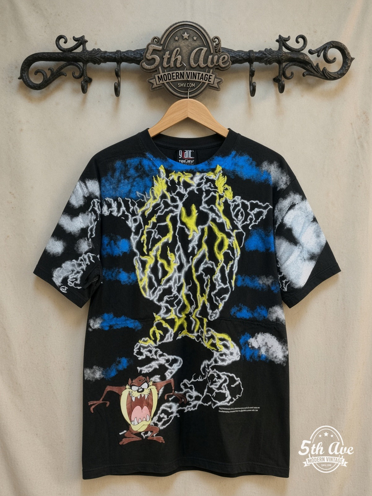 Looney Tunes – Taz-Mania Iconic Design – All Over Print – New Vintage Graphic Tee — front on locked cream ornate 5th Ave rack