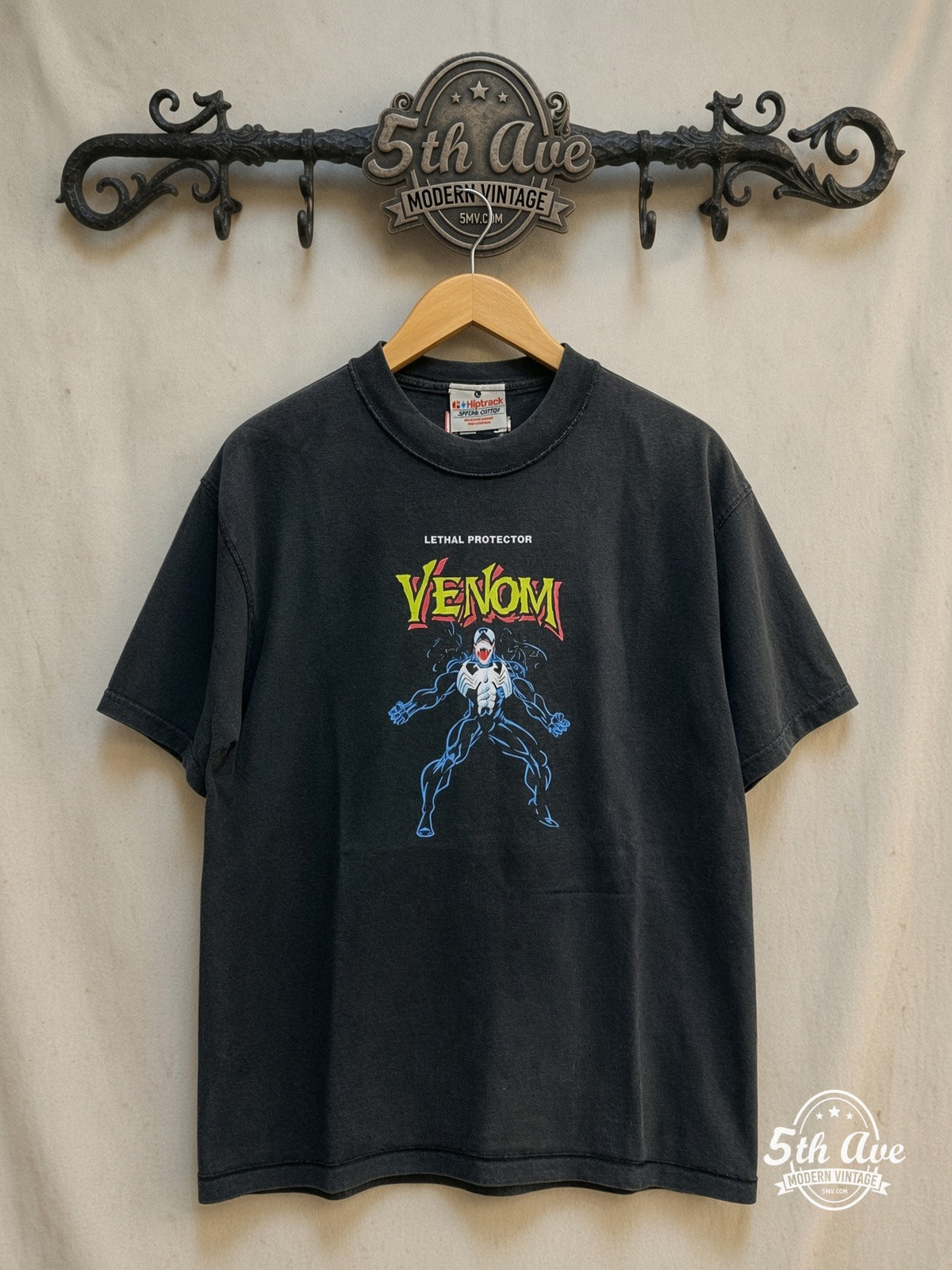 Venom Inside-Out Graphic vintage band t-shirt on rack