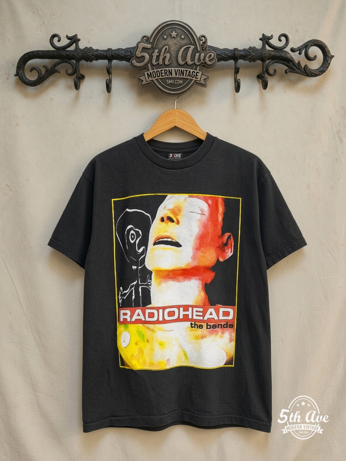 Radiohead – The Bends Mannequin Face Tracklist – Vintage Band T-Shirt — front on locked cream ornate 5th Ave rack