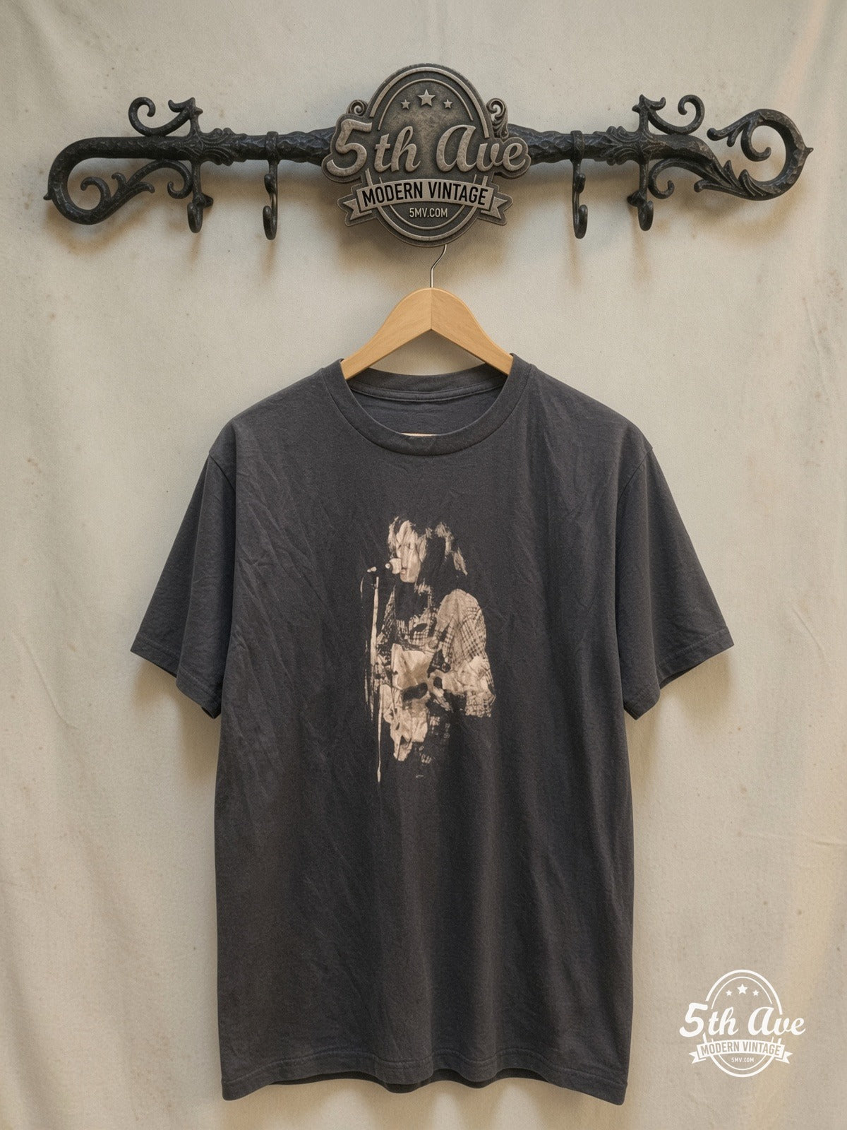 Neil Young – Black-and-White Performance with Captain Boot Tag – Vintage Band T-Shirt — front on locked cream ornate 5th Ave rack