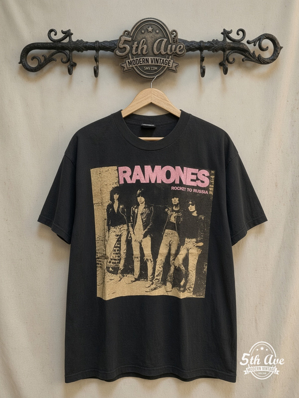 The Ramones Live at the CBGB's 1977 – Vintage Band T-Shirt — front on locked cream ornate 5th Ave rack