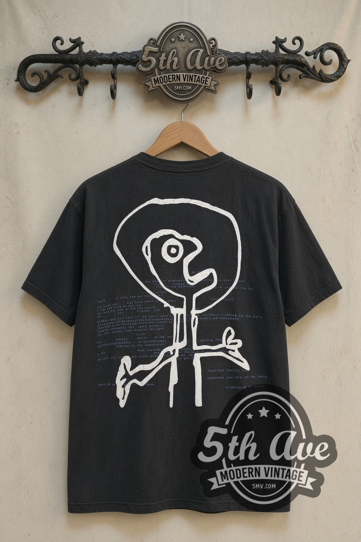 Radiohead Bends stick figure drawing on shirt back on cream rack