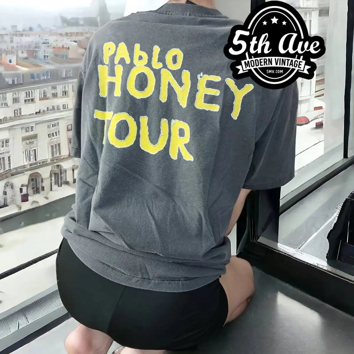 Radiohead – Pablo Honey Baby Glowing Eyes vintage t-shirt laid on bed