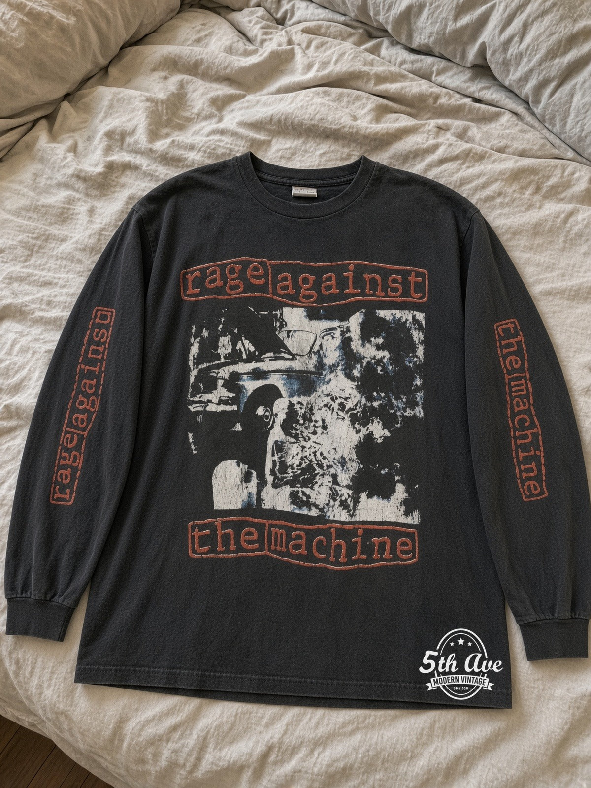Rage Against the Machine 1992 Album Immolation Fuck You I Won't Do What You Tell Me LS vintage tee laid on bed
