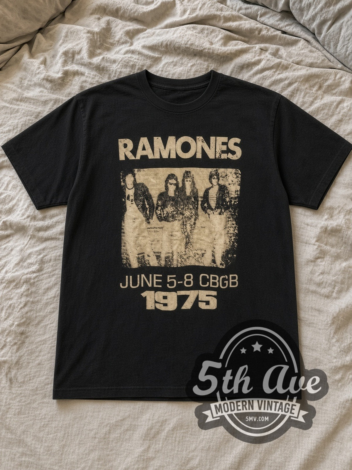 Black Ramones CBGB June 1975 Band Photo Vintage Band T-Shirt laid flat on a linen bed