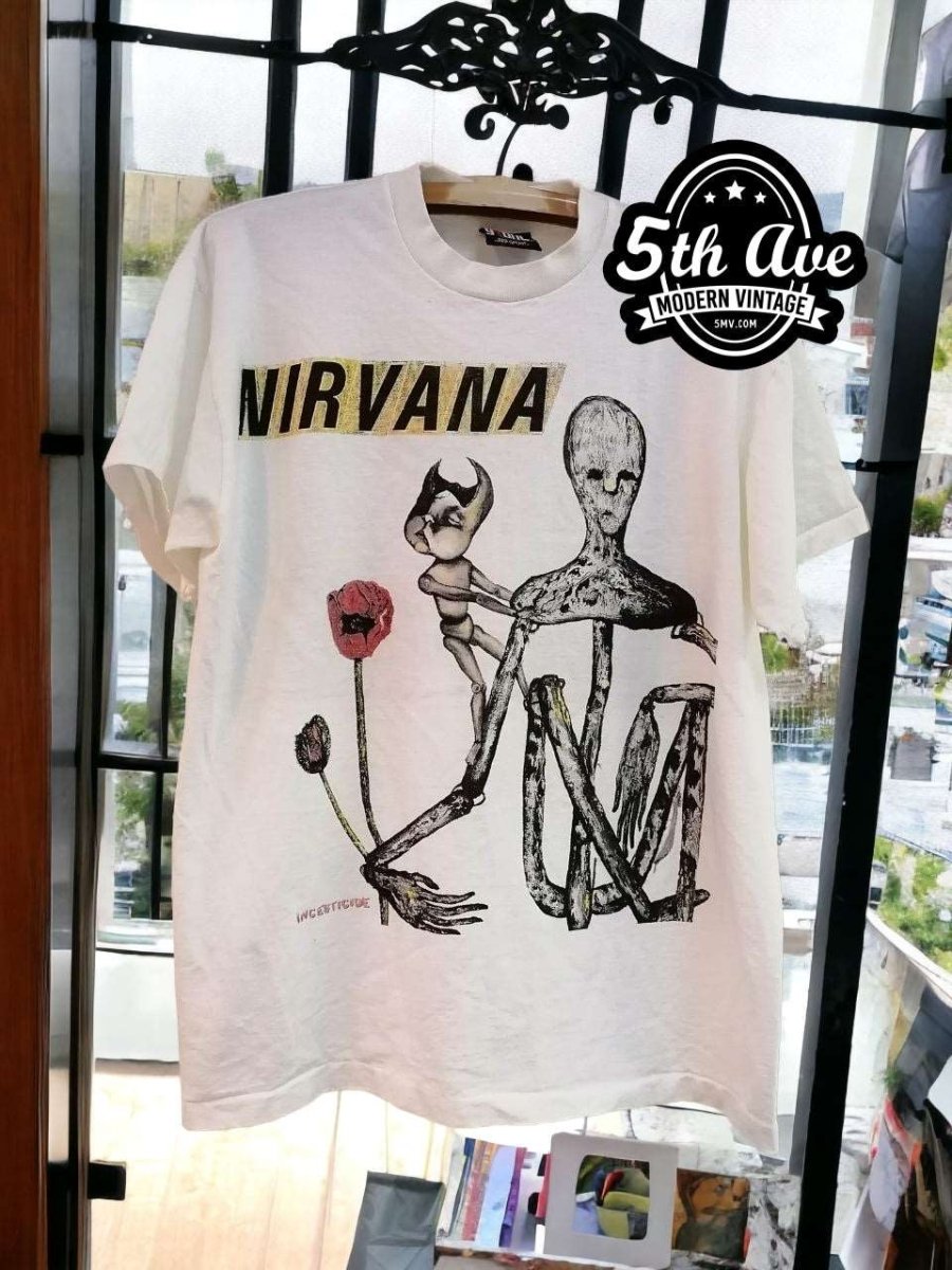 Rebellion Unleashed: The Nirvana Insecticide Experience - Vintage Band Shirts