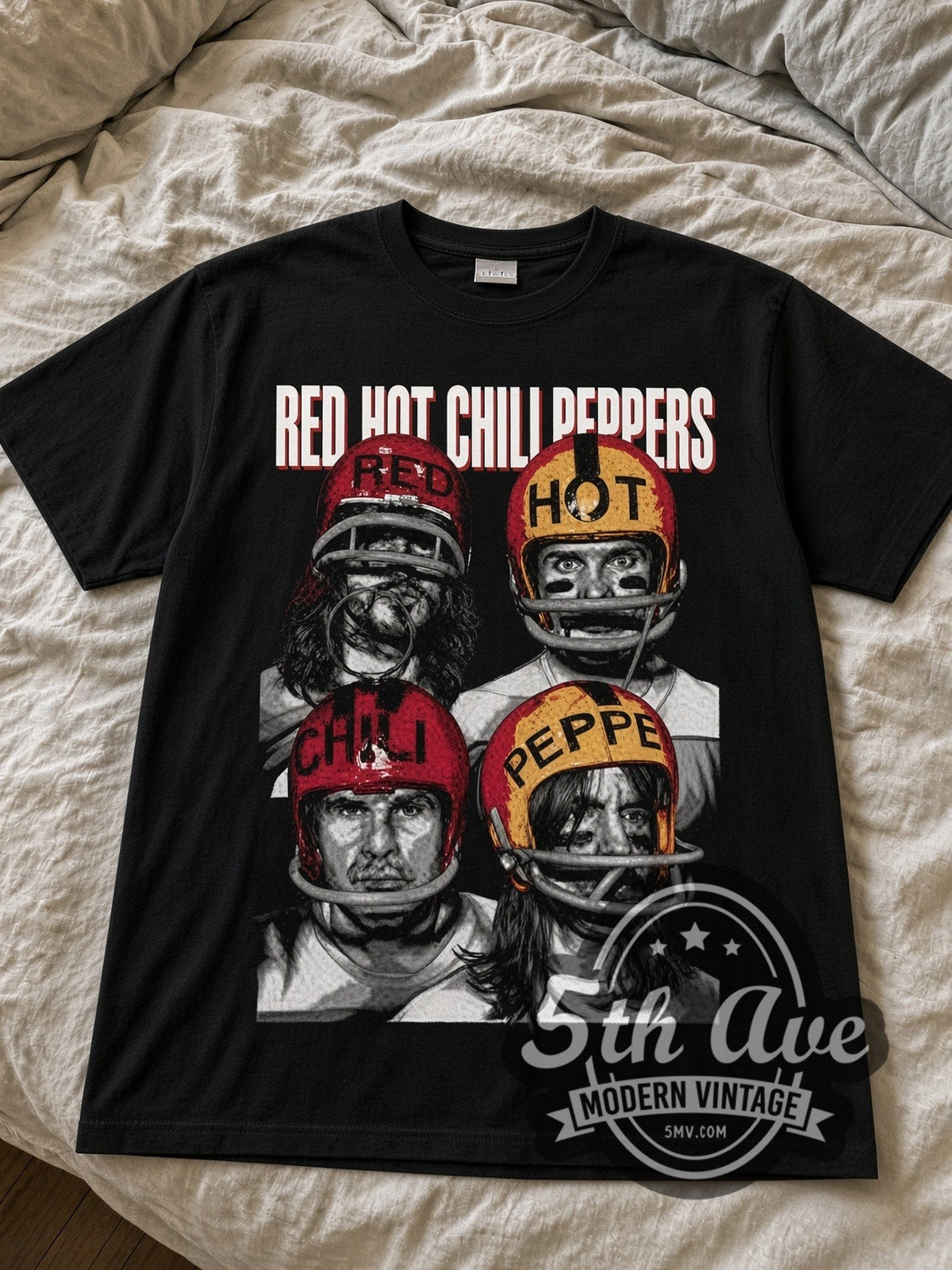 Red Hot Chili Peppers Football Helmet Band black graphic tee laid flat on linen bed
