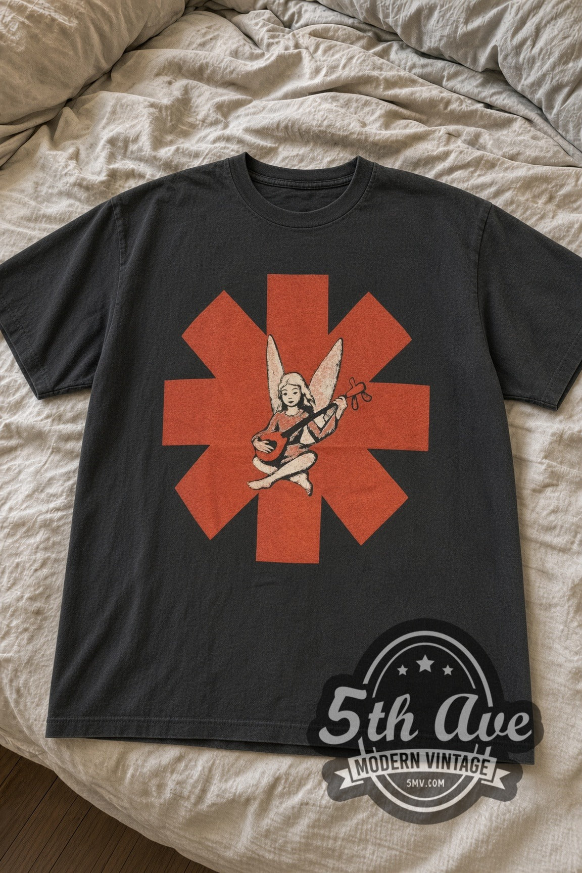 Red Hot Chili Peppers Mandolin Angel Red Asterisk vintage band t-shirt laid flat on bed