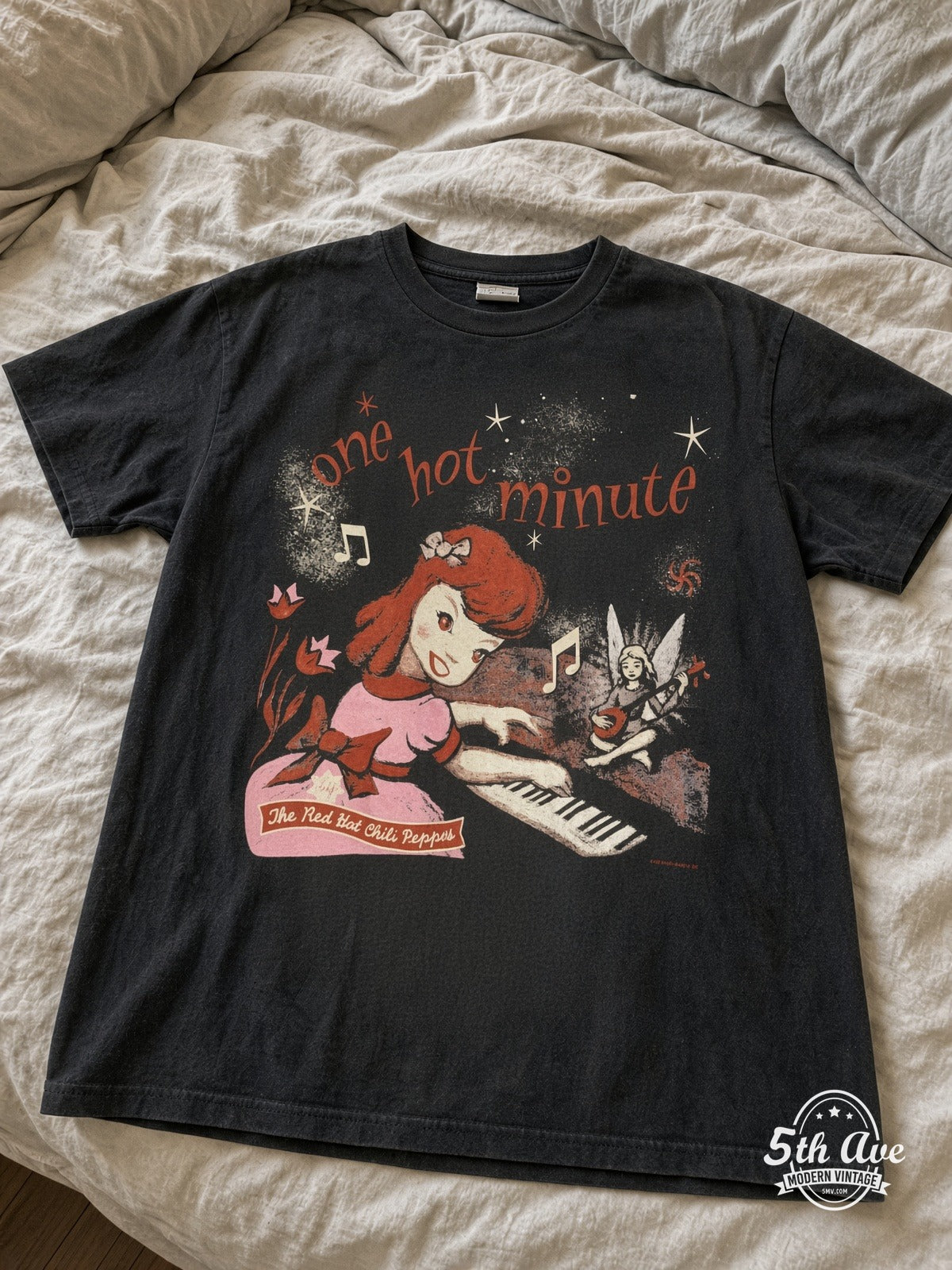 Red Hot Chili Peppers One Hot Minute World Tour 1995 vintage tee laid on bed