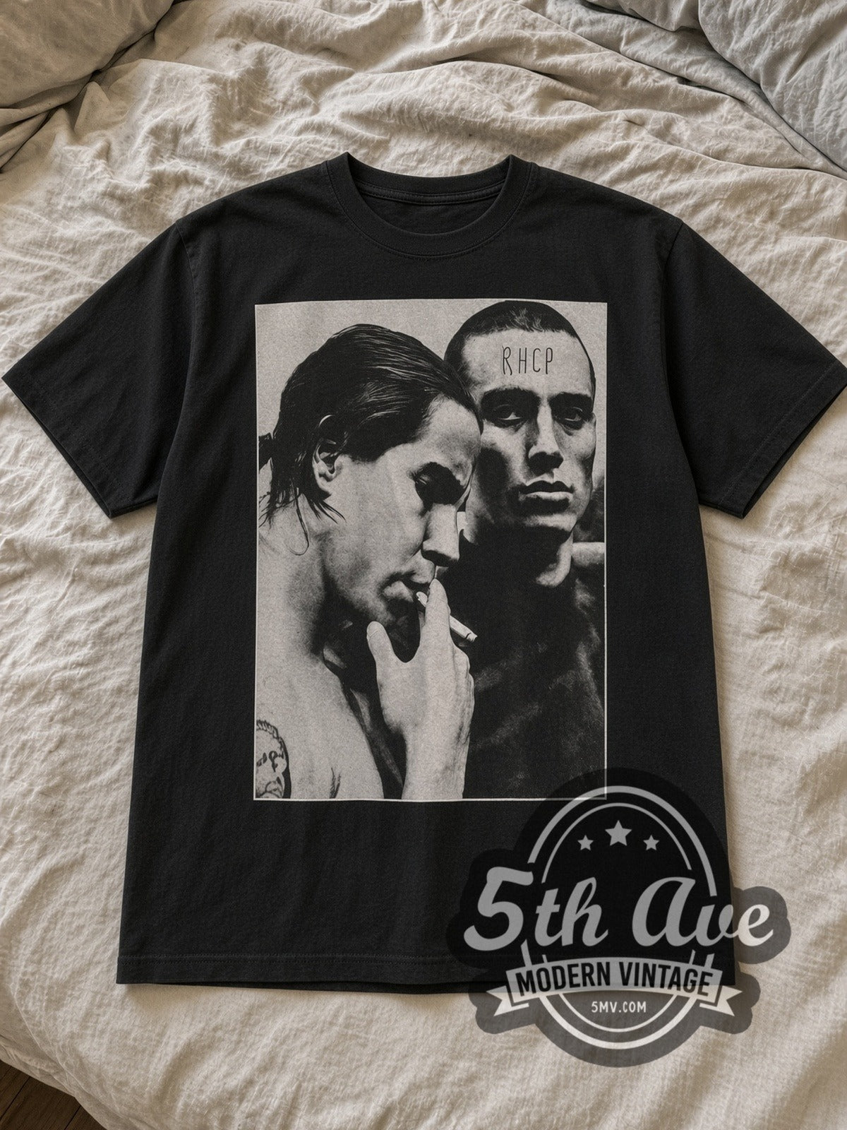 Black Red Hot Chili Peppers Flea and Anthony Kiedis Vintage Band T-Shirt laid flat on a linen bed