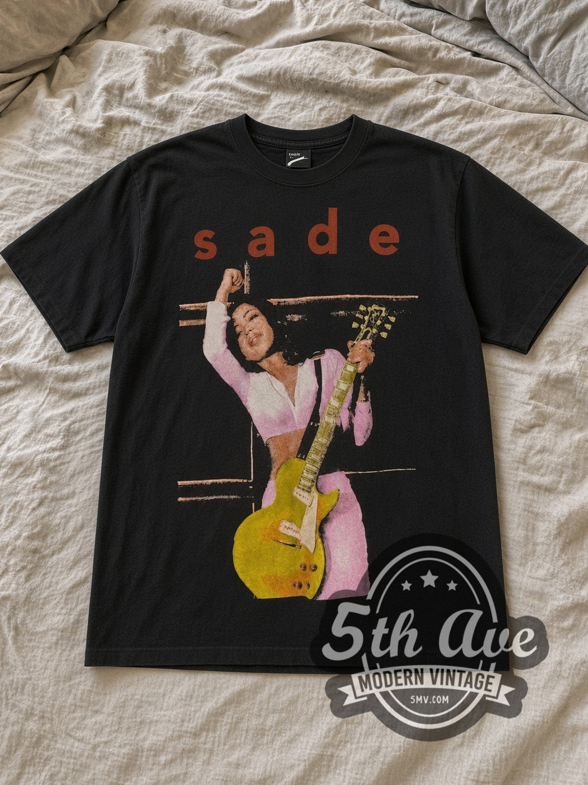 Black Sade Summer Deluxe Tour 1993 Vintage Band T-Shirt laid flat on a linen bed