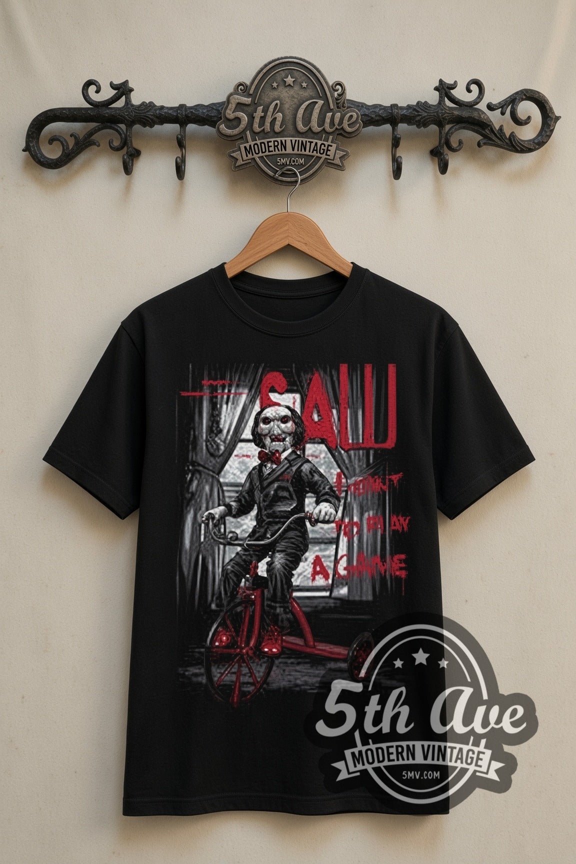 Saw Billy the Puppet tricycle double stitched black tee front on dark iron 5th Ave rack