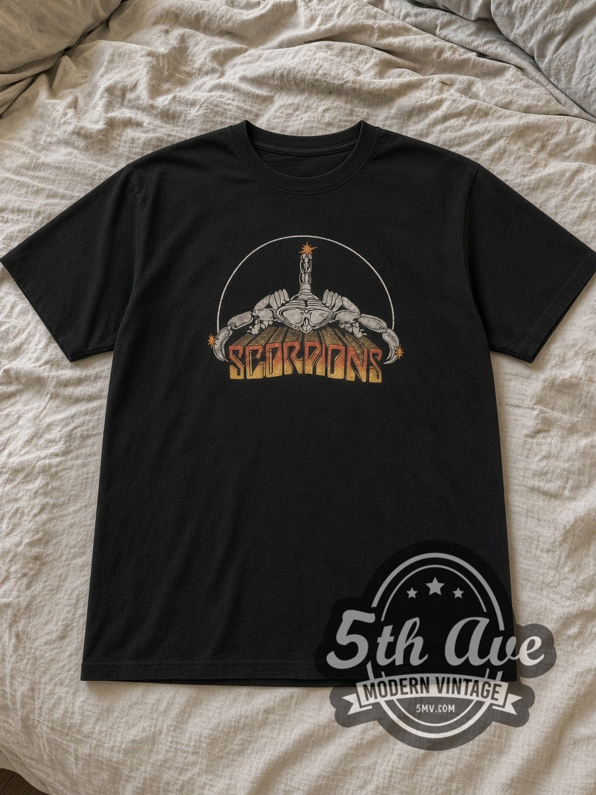 Black Scorpions Vintage Band T-Shirt laid flat on a linen bed