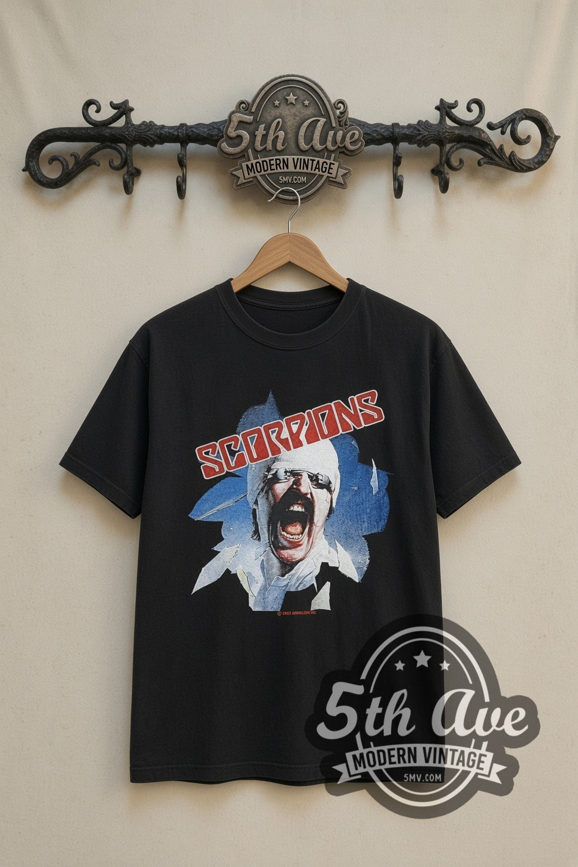 Scorpions Blackout Final Sting 1987 band t-shirt in black, front view on a display rack