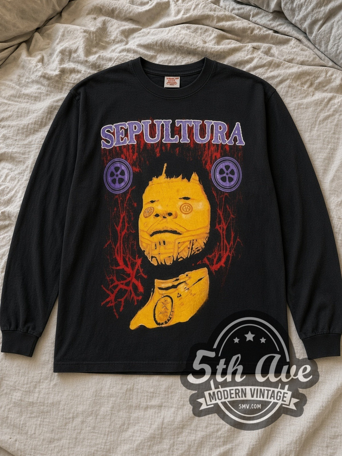 Black Sepultura Roots Vintage Band Long Sleeve T-Shirt laid flat on a linen bed