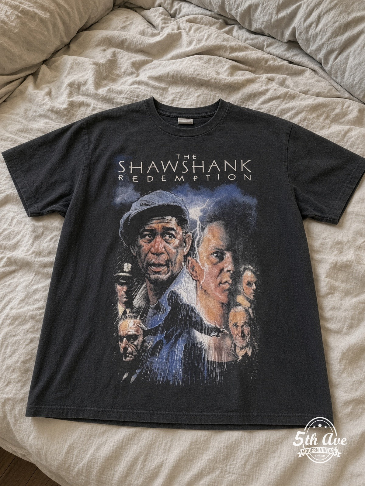 The Shawshank Redemption Cast Collage vintage tee laid on bed