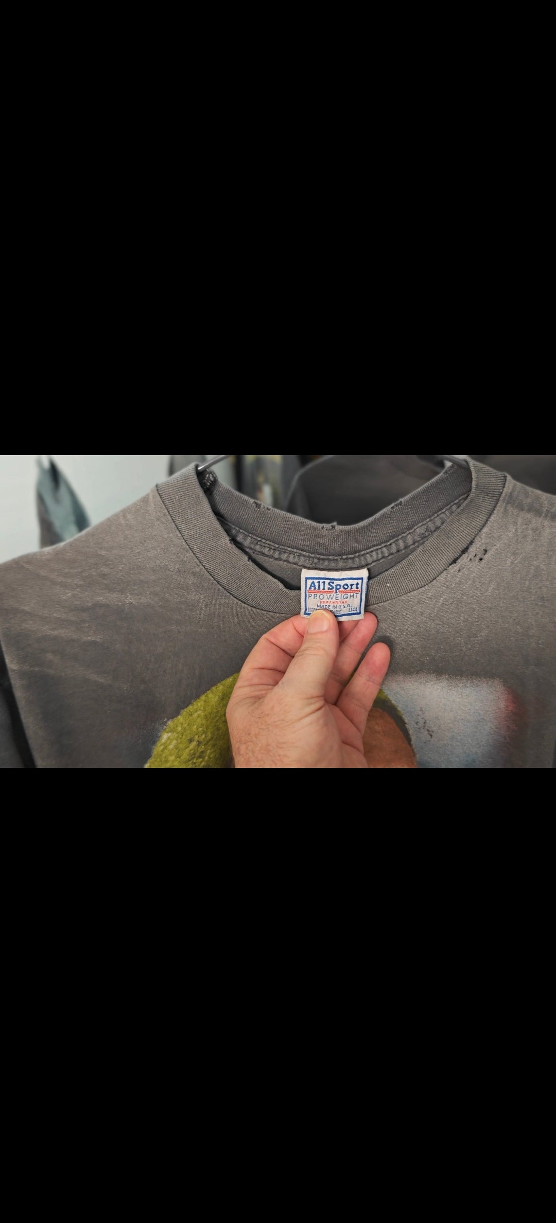 Collar and neckline distressing with vintage tag — shirt distressing result