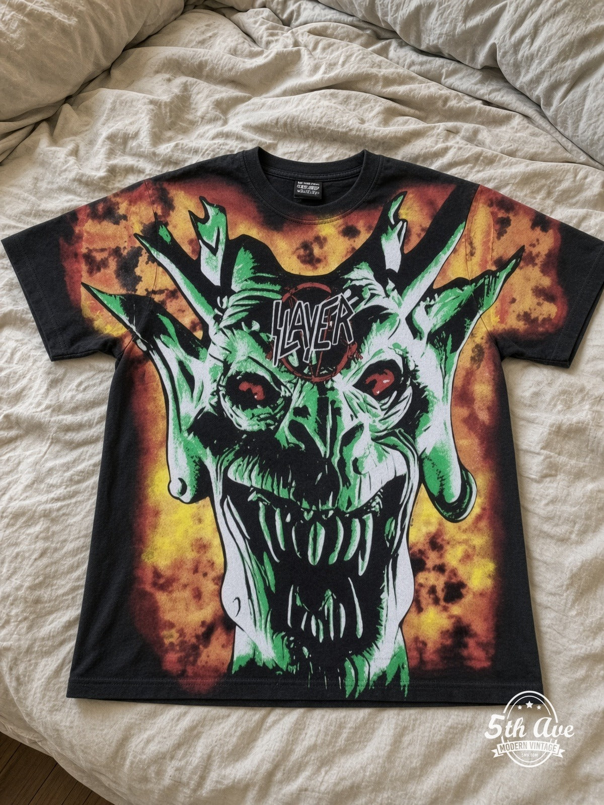 Slayer Demon Flames all over print vintage tee laid on bed