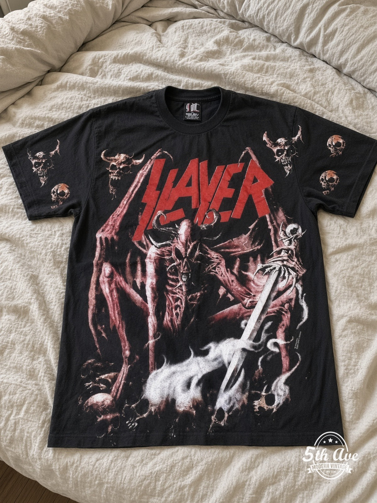 Slayer Skeletal Demons all over print vintage tee laid on bed
