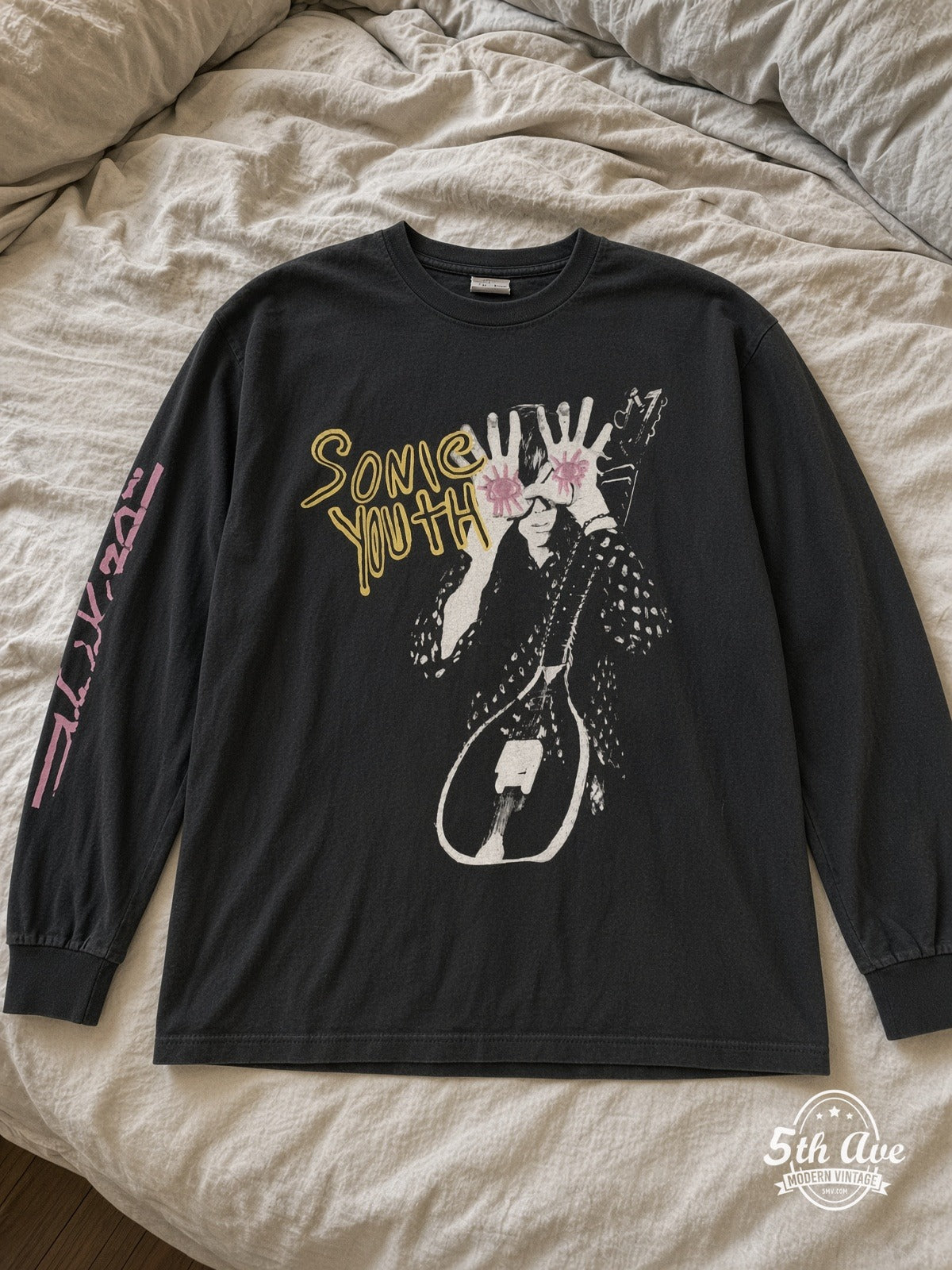 Sonic Youth Sister / Kim Gordon Pink Eyes Long Sleeve vintage tee laid on bed
