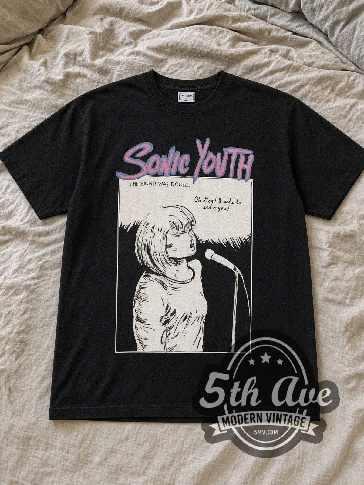 Black Sonic Youth The Goo I Left Behind Vintage Band T-Shirt laid flat on a linen bed