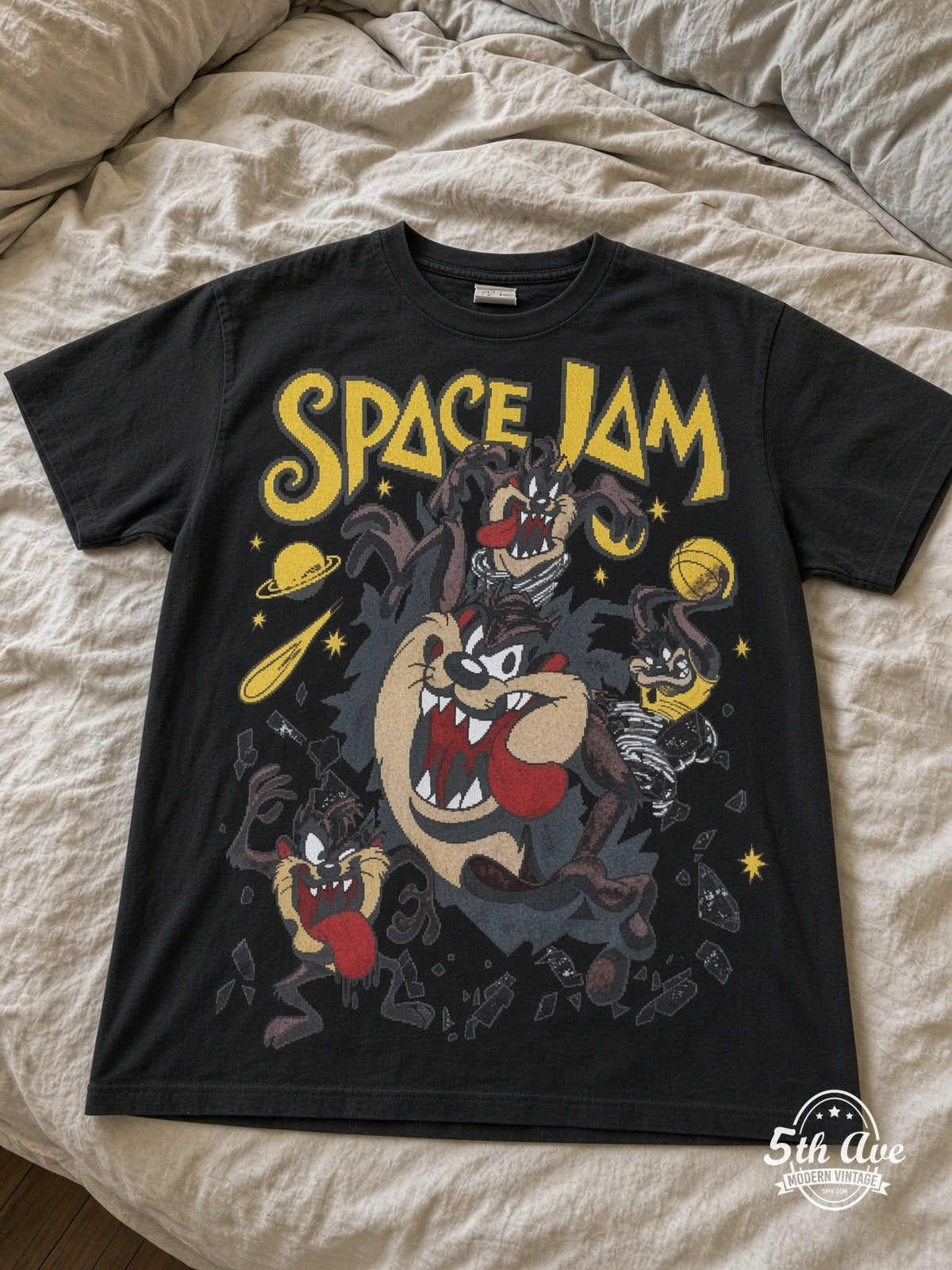 Space Jam Space Jam Taz Center vintage tee laid on bed