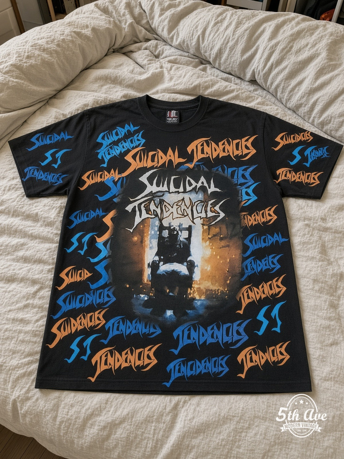 Suicidal Tendencies Logos Skeleton all over print vintage tee laid on bed
