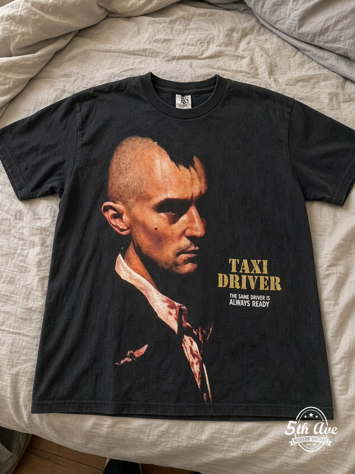 Taxi Driver You Talkin' To Me? Mohawk vintage tee laid on bed