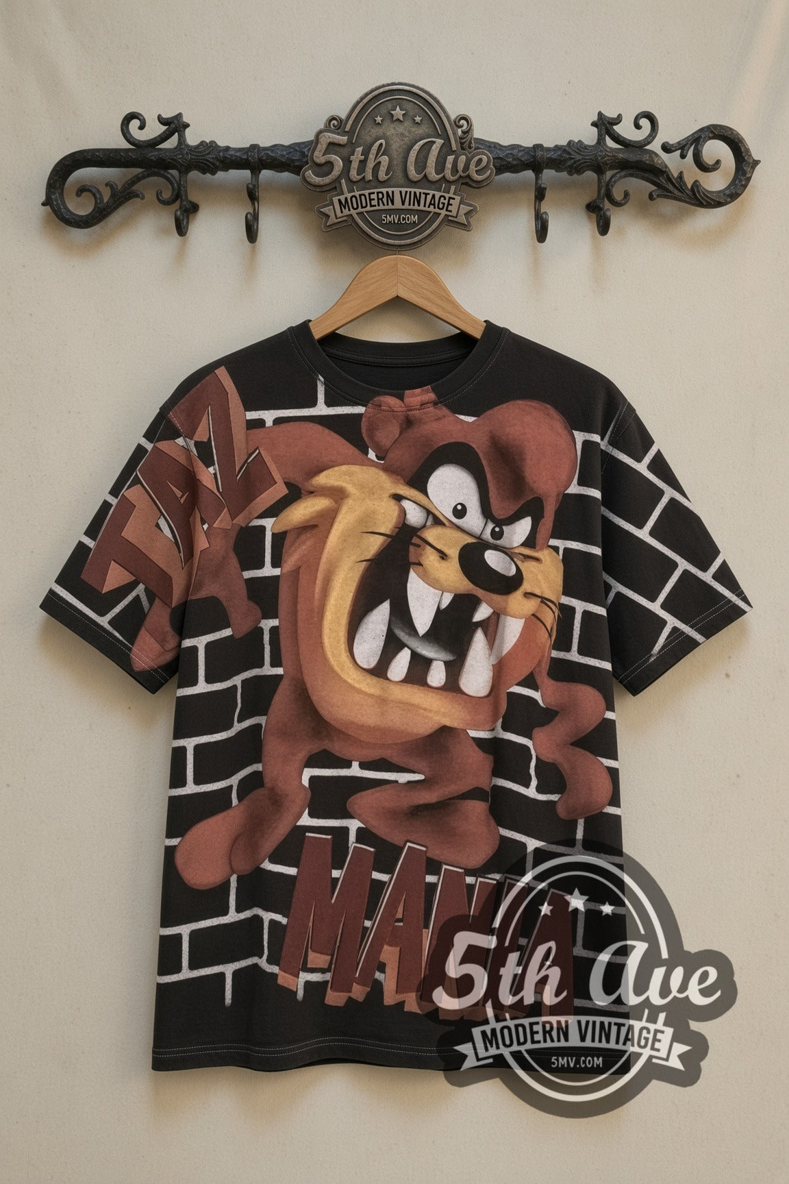 Looney Tunes Taz-Mania all-over-print vintage cartoon t-shirt on the 5MV rack, front view: Taz faces printed all over