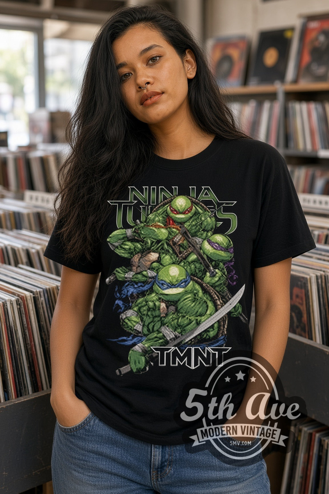 Woman wearing Teenage Mutant Ninja Turtles Four Turtles double stitched black graphic tee