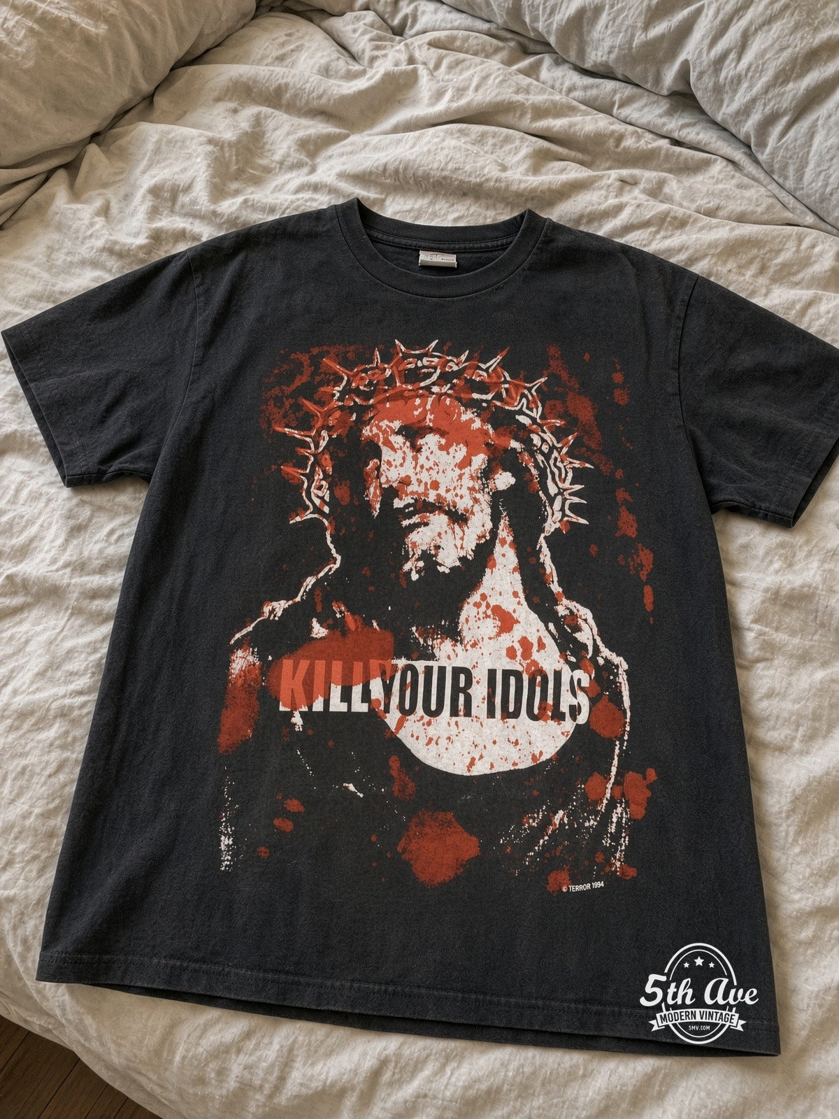 Terror Kill Your Idols vintage tee laid on bed