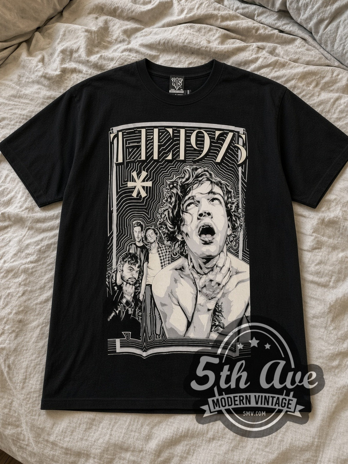 Black The 1975 Matty Healy Shirtless Band Asterisk Vintage Band T-Shirt laid flat on a linen bed
