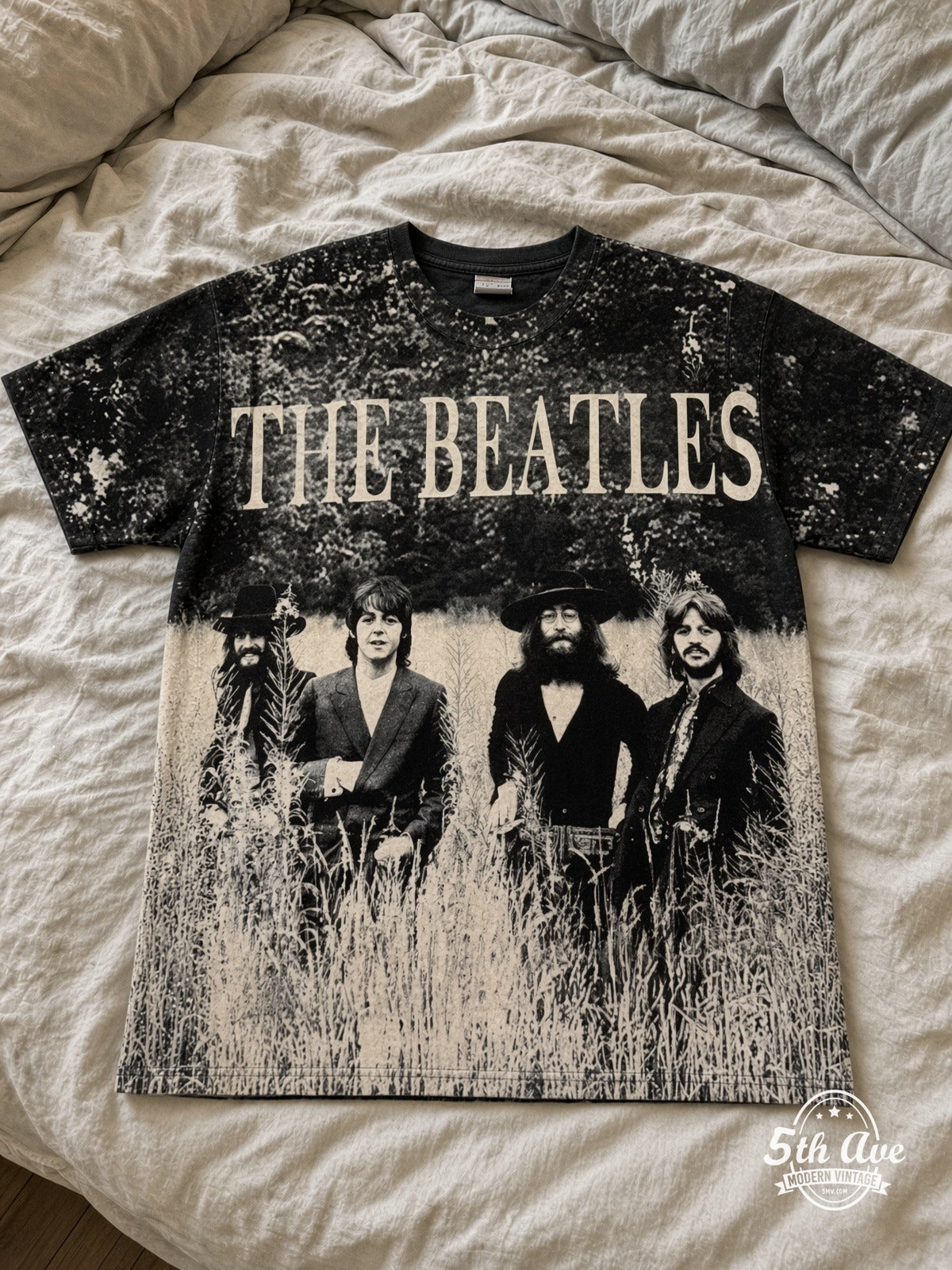 The Beatles Field Photo Lighter all over print vintage tee laid on bed