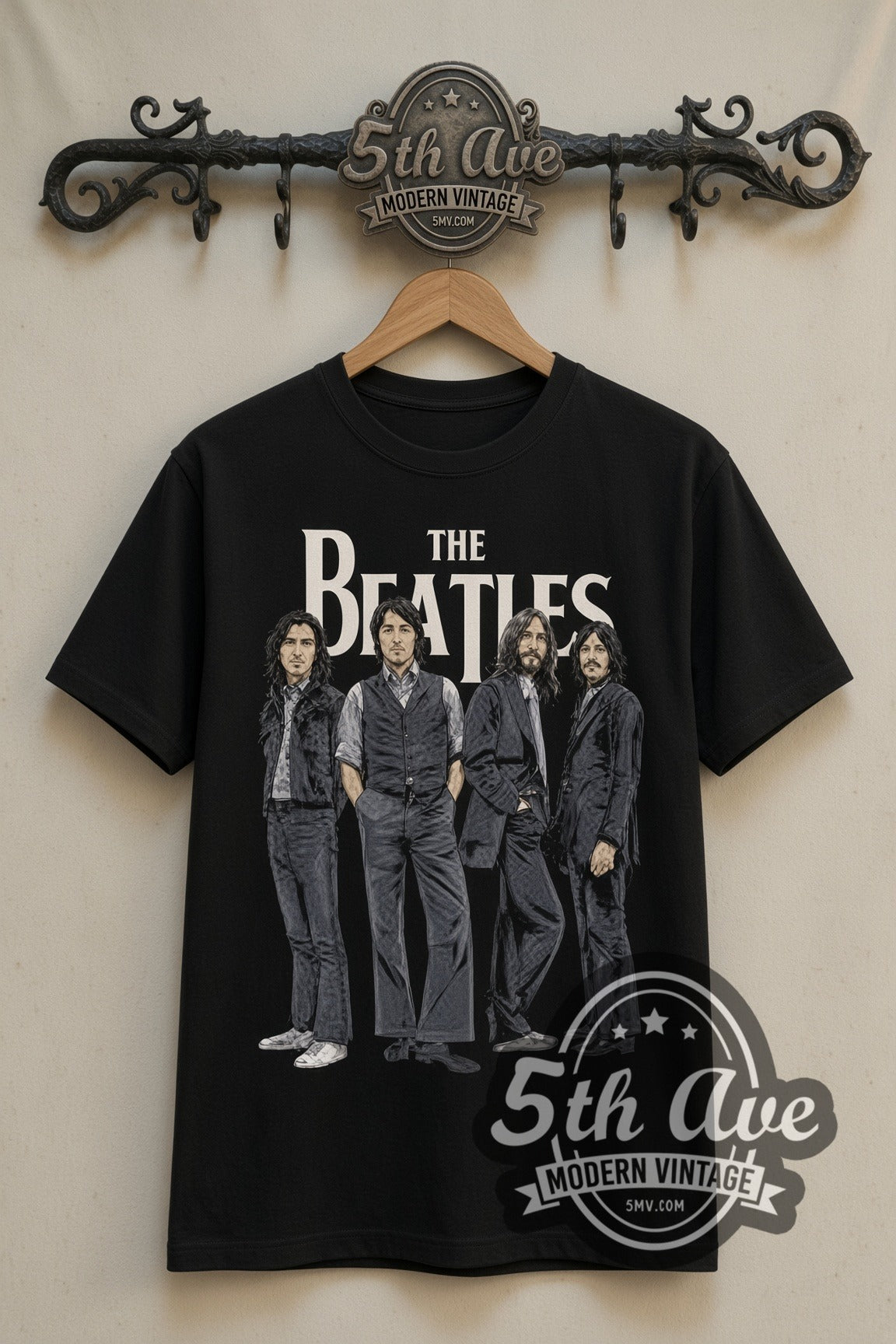 The Beatles group portrait double stitched black tee front on dark iron 5th Ave rack