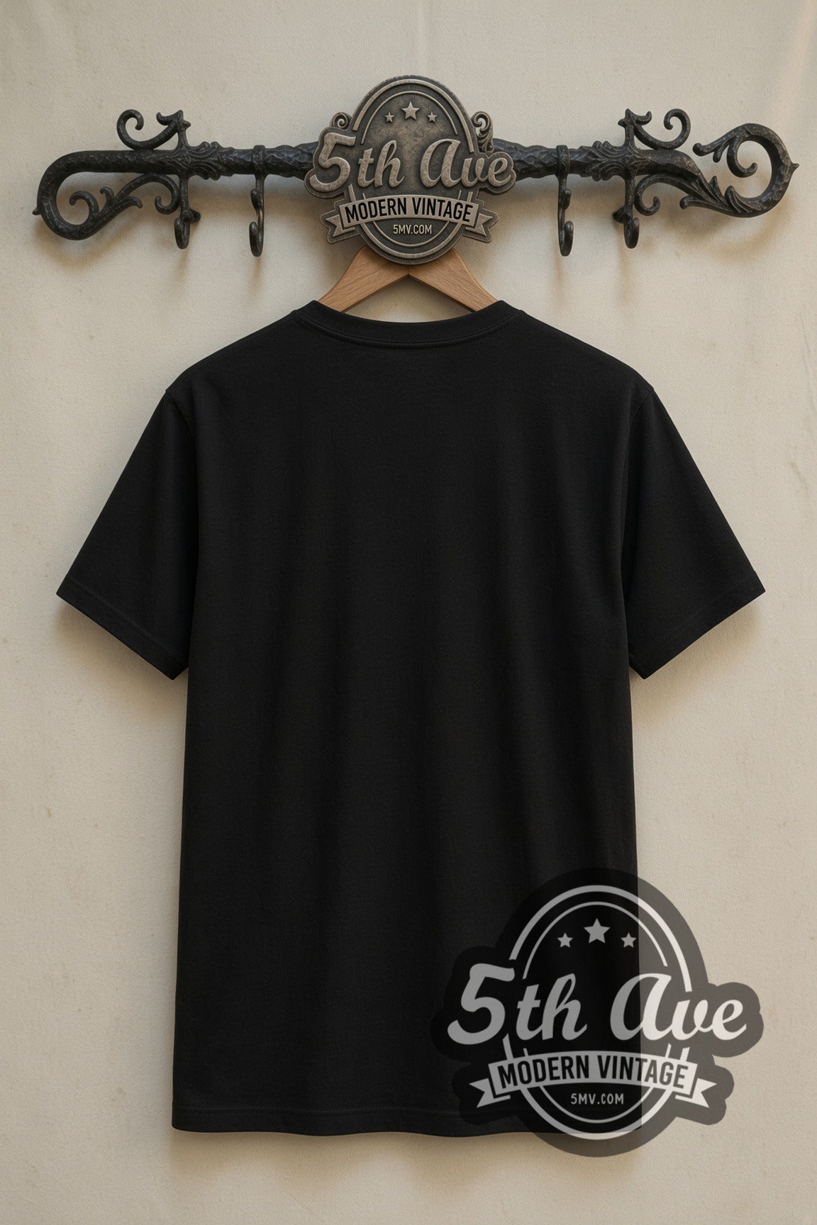 Plain black back of The Beatles group portrait double stitched tee on rack
