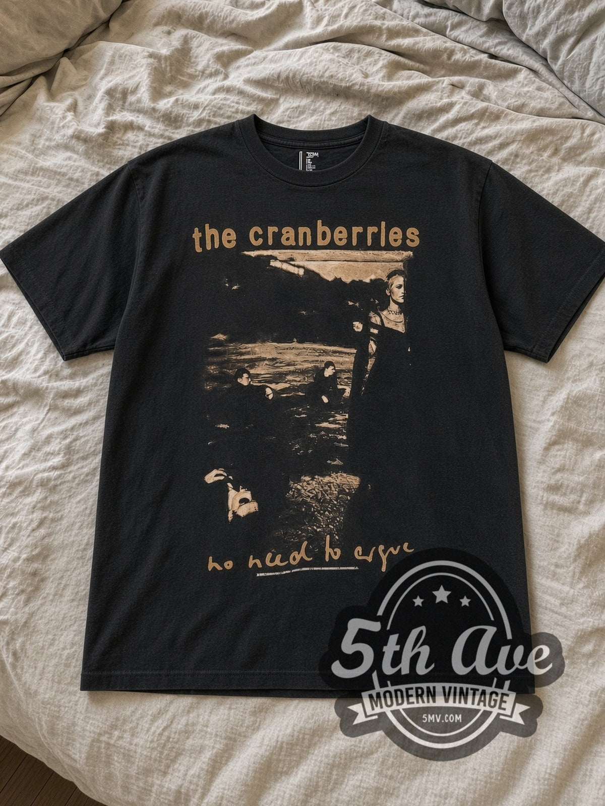 Black The Cranberries No Need to Argue World Tour 1995 Vintage Band T-Shirt laid flat on a linen bed