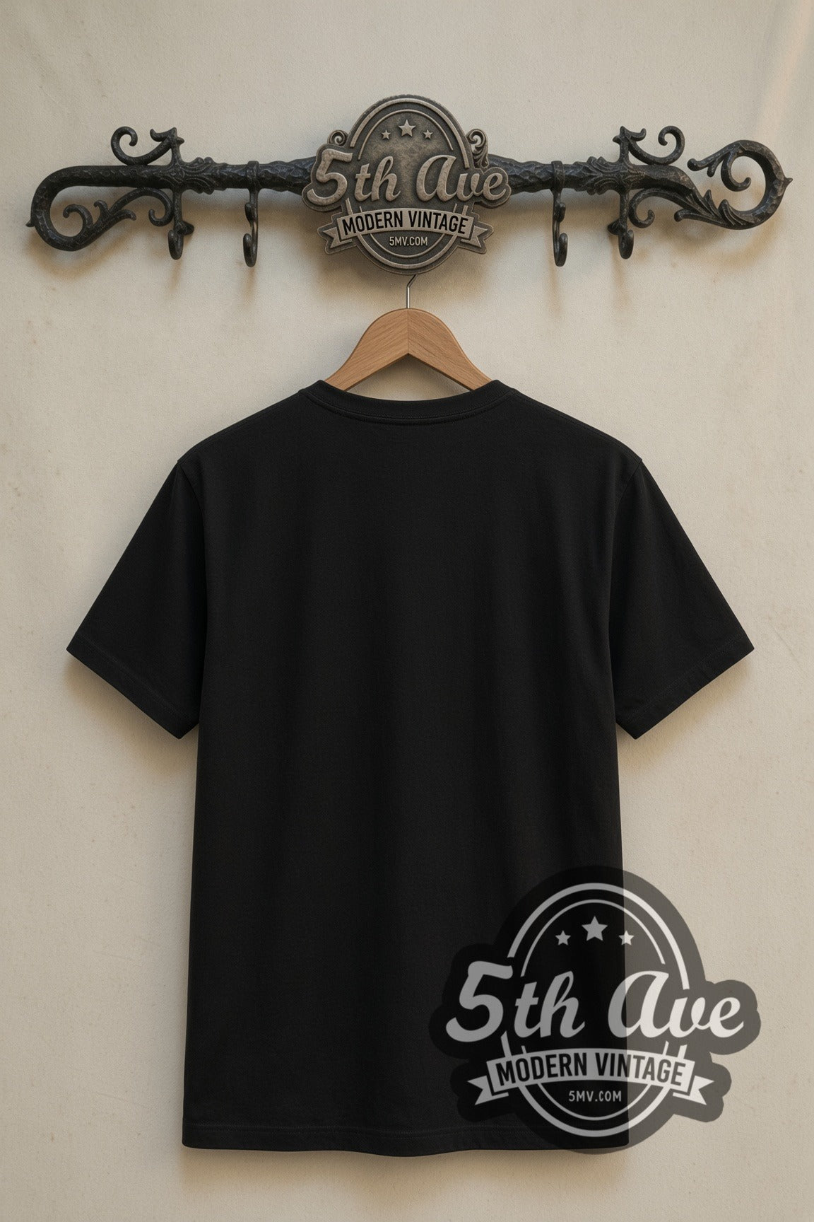 Plain black back of The Dark Knight Joker Black Timber Portrait double stitched tee on rack