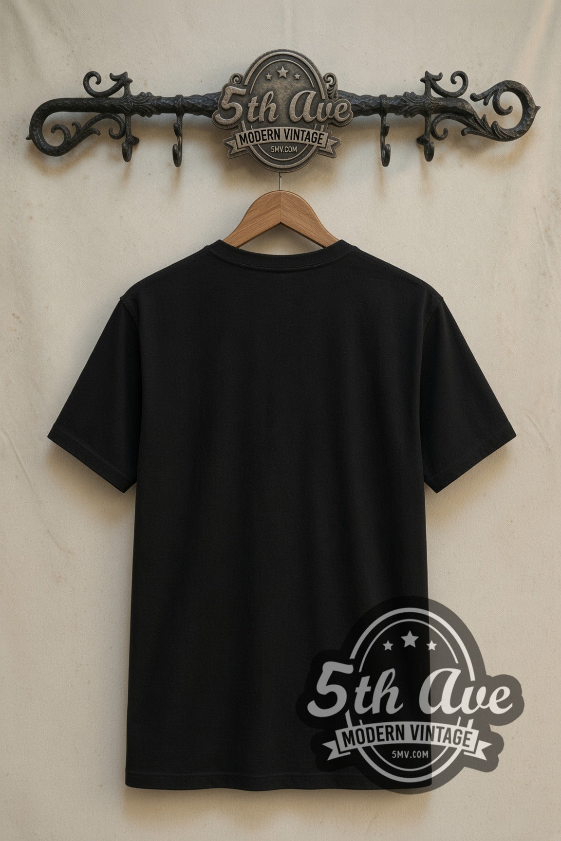 Plain black back of Joker Why So Serious Dark Knight double stitched tee on rack