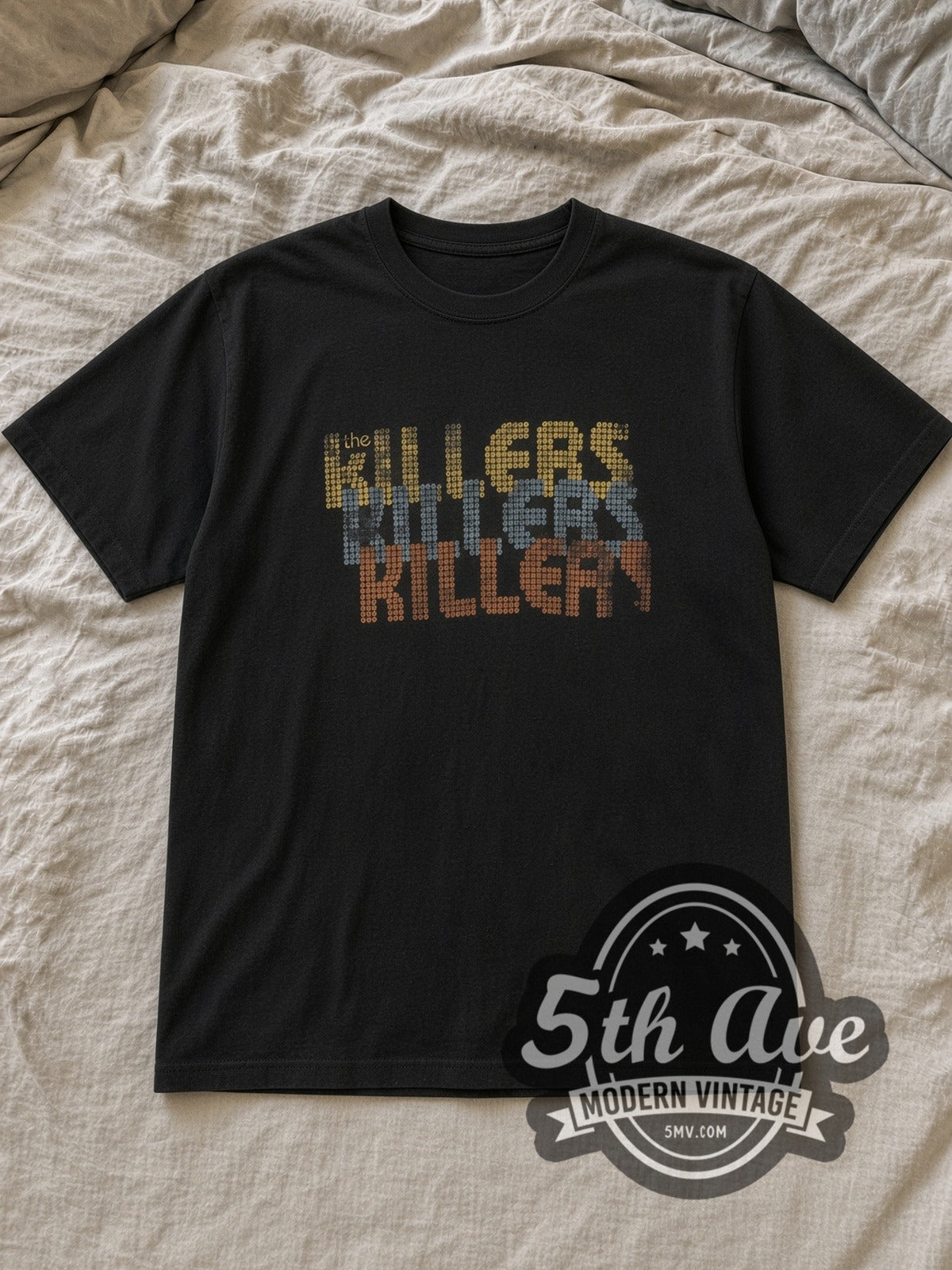Black The Killers Retro Pixel Art Killers Vintage Band T-Shirt laid flat on a linen bed