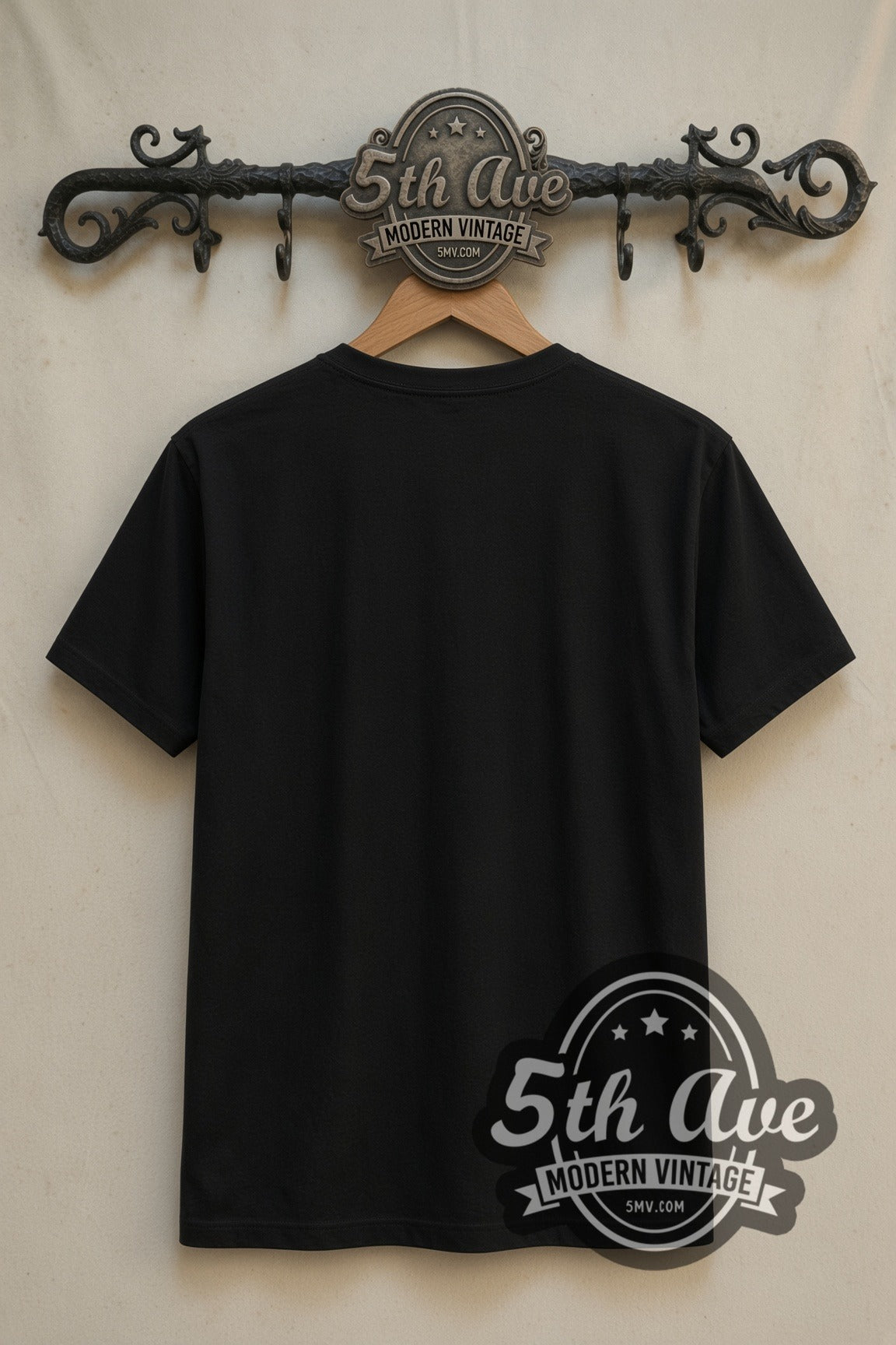 Plain black back of The Marvels Captain Marvel and Goose double stitched vintage movie tee on rack