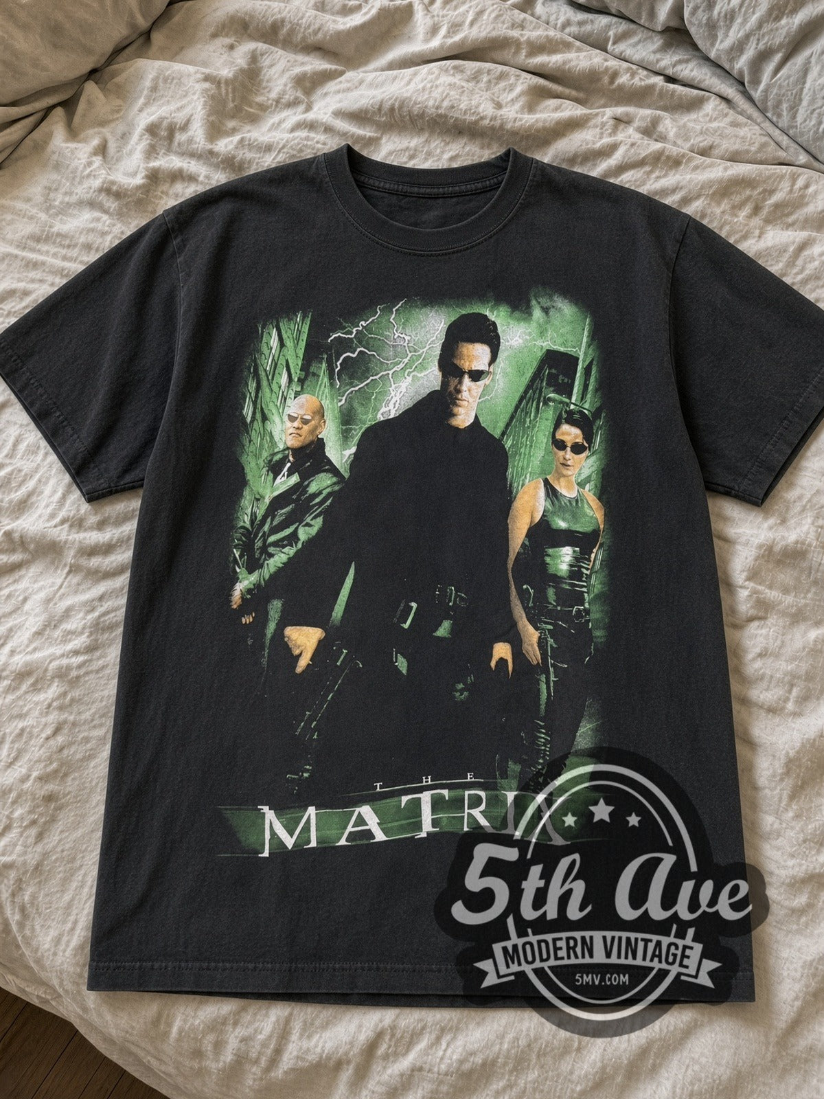 Black The Matrix Neo Morpheus Trinity and Red Blue Pill tee laid flat on linen bed