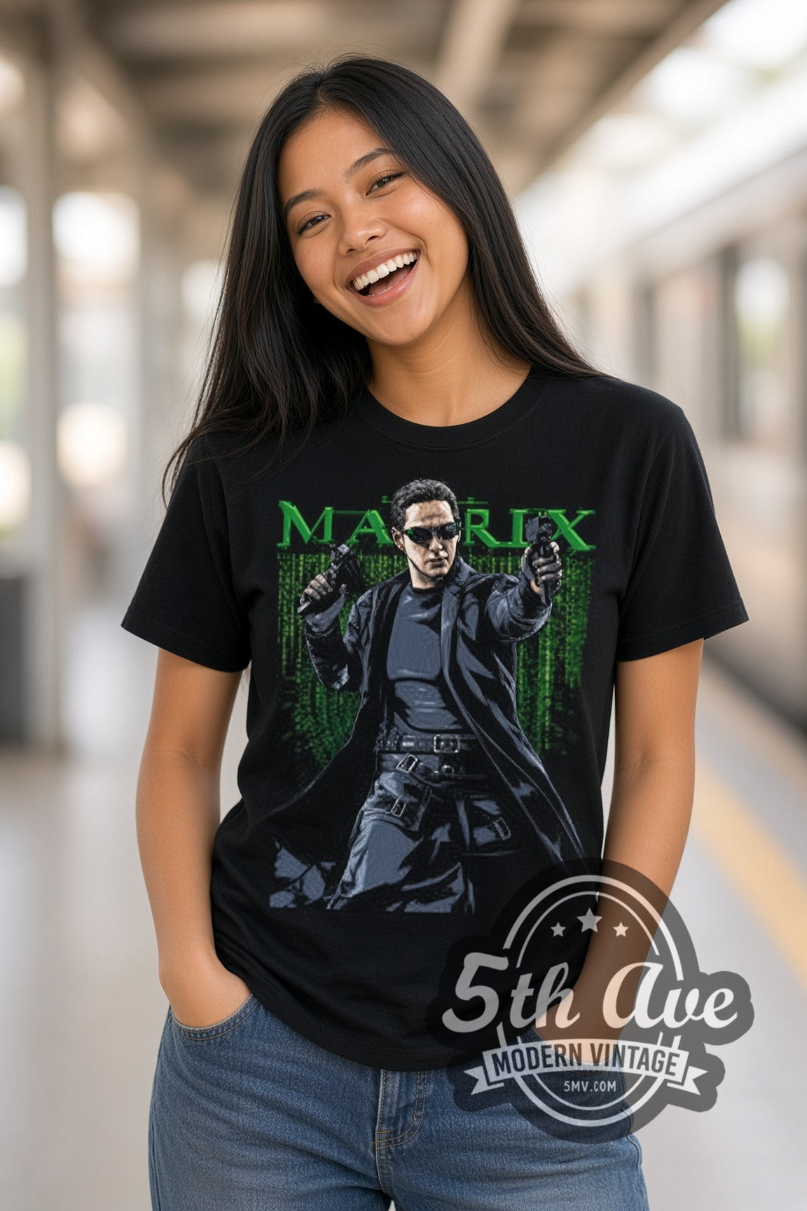 Woman wearing The Matrix Neo with Pistols double stitched black graphic tee