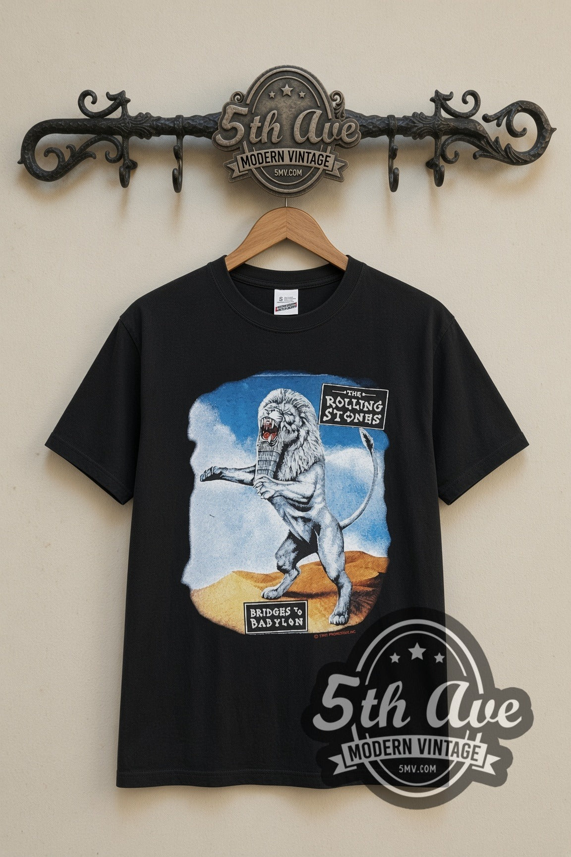 The Rolling Stones Bridges to Babylon Lion band t-shirt in black, front view on a display rack